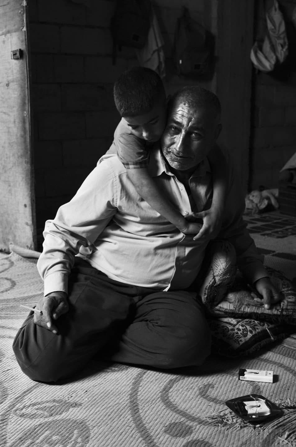 Padre e figlio nel campo di Tal Abbas